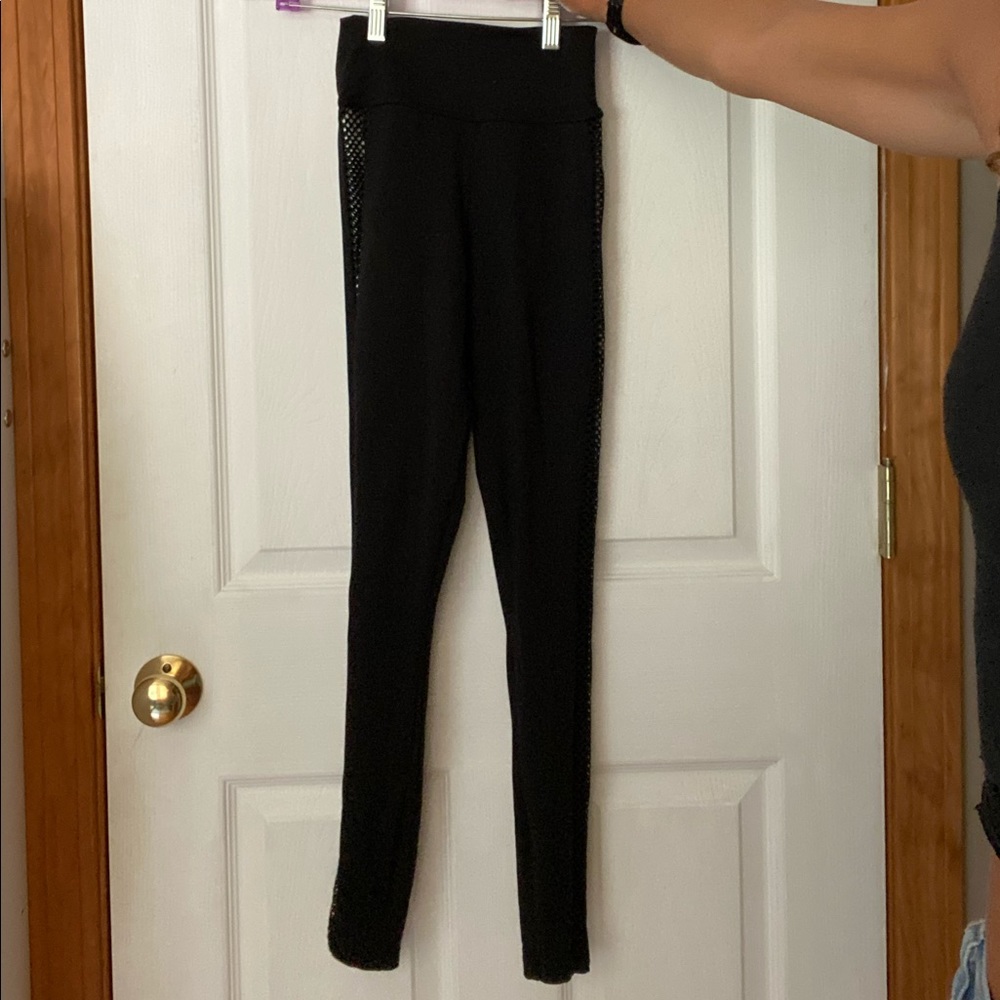 Black athletic leggings.